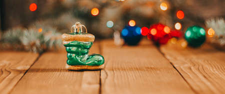 Merry Christmas. Christmas composition with holiday decorations on a wooden background. Christmas or New Year card. Background. Christmas symbol. Happy Holidays. photo bannerの写真素材