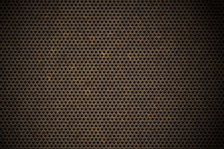 perforated metal background の写真素材