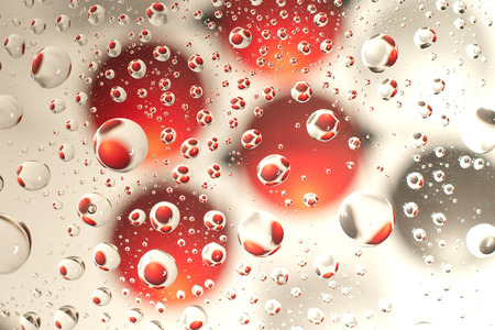 water droplets as small lenses over a colored background