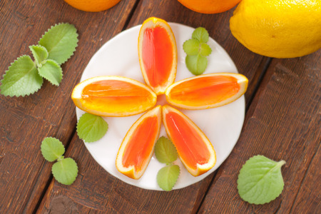 jelly orange slices on a plateの写真素材