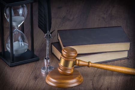 judge's gavel on a wooden worktop.の写真素材