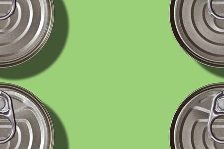 Food cans frame on green color background. Minimal food の写真素材