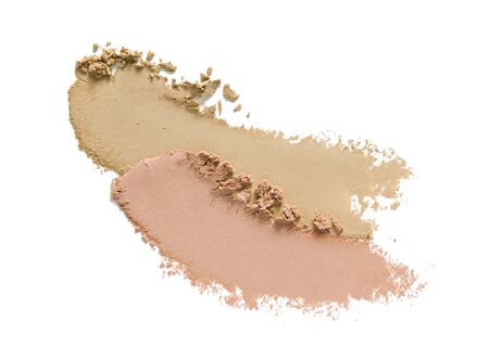 Face powder makeup texture. Foundation powder strokes of different tones. Nude neutral color eye shadow swatch smear smudge isolated on white backgrund. Cosmetic beauty product macro photographyの写真素材