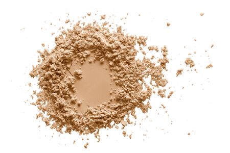 Makeup powder texture. Crushed  beige foundation swatch isolated on white background. Natural color cosmetics sampleの写真素材