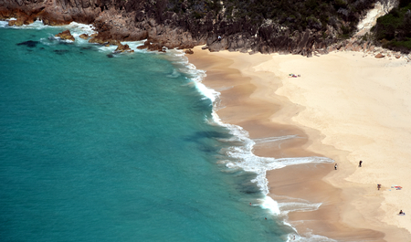 Few people on the beach in Spring time. Beach as a background or wallpaper.の写真素材