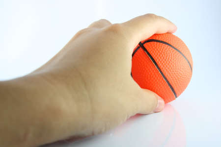 Hand Picking up ballの写真素材
