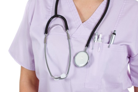 A close-up of a stethoscope worn round a female doctorの写真素材