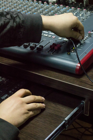 Hands of man at recording sound.の写真素材