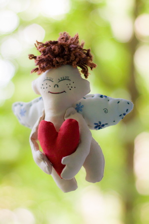 Cherub with a Red Heart. Soft toy. Gift.