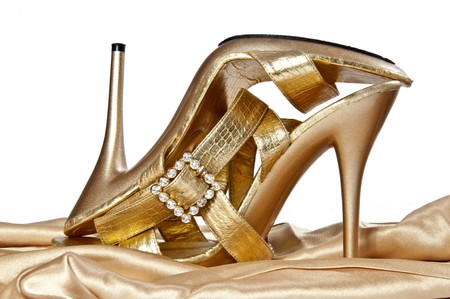 Sexy golden shoes on a high heelの写真素材