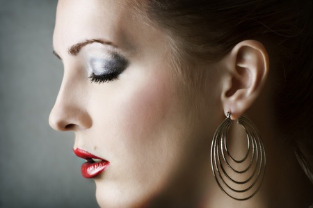 Fashion woman portrait. Make up and earringsの写真素材