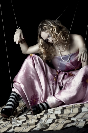 Young woman with beauty hair. Marionette conceptの写真素材