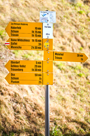 VADUZ - February 11: St. Yellow sign in the main part of the city in February 11, 2014 in Vaduz. Vaduz is the capital of principality Liechtenstein (famous banking country).のeditorial素材