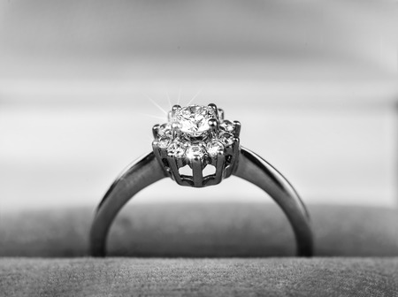Diamond ring in gift box. Macro view, black and whiteの写真素材