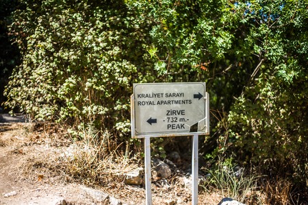 KYRENIA, CYPRUS - AUGUST 09, 2018: turkish republic of northern cyprus, sign board with an inscription for tourists in the St. Hilarion Castleのeditorial素材