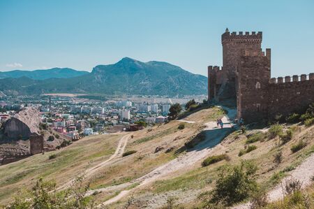 SUDAK, RUSSIA - JULY, 22, 2016 Walls and towers of an ancient Genoese fortress in the city of Sudak, Crimea, Russiaのeditorial素材