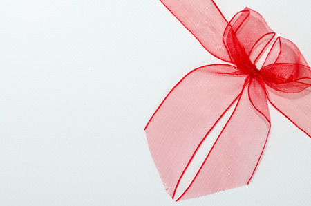 red ribbon on white backgroundの写真素材