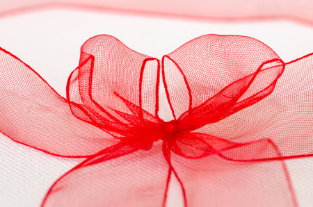 red ribbon on white backgroundの写真素材