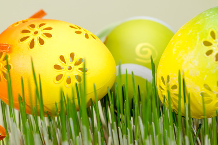 yellow easter eggs on green grass