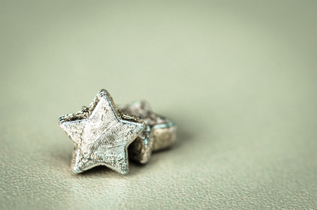 macro of two silver stars