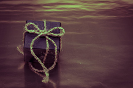 blue gift box over shining backgroundの写真素材