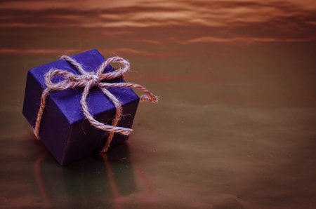 blue gift box over silver backgroundの写真素材