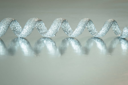 silver christmas ribbon decoration imageの写真素材