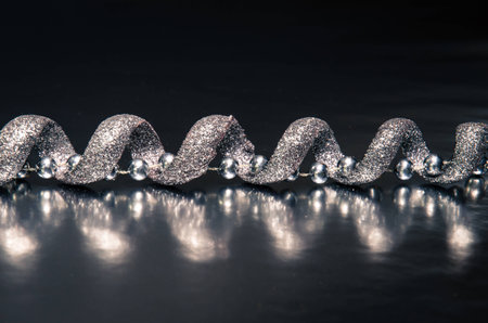 silver christmas ribbon decoration imageの写真素材