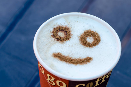 coffee to go with smile faceの写真素材