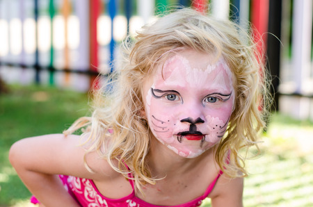 beautiful blond girl with face paintingの写真素材