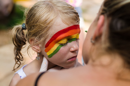 beautiful blond girl with face painting