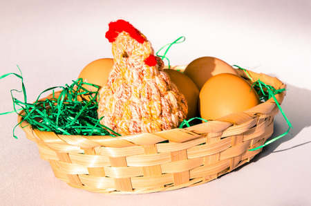 easter eggs in wooden basketの写真素材