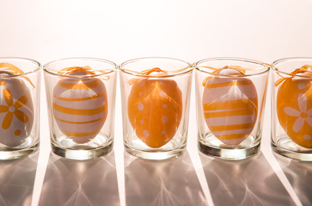 group of orange easter eggs in glass imageの写真素材