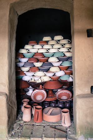 clay ceramics colorful bowls and mugsの写真素材