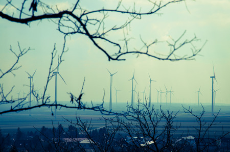 several windmills and village image