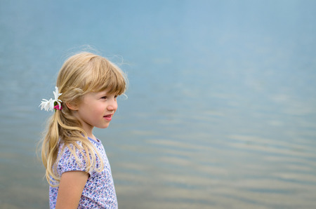 beautiful little blond girl portraitの写真素材