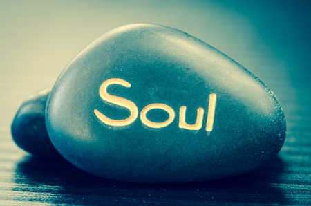 black lava stone with words soulの写真素材