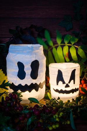 two white pumpkin jar decoration illuminatedの写真素材