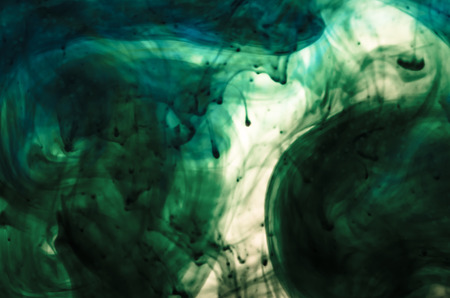 scary dark green abstract pattern in waterの写真素材