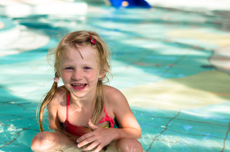 happy child in the swimming poolの写真素材