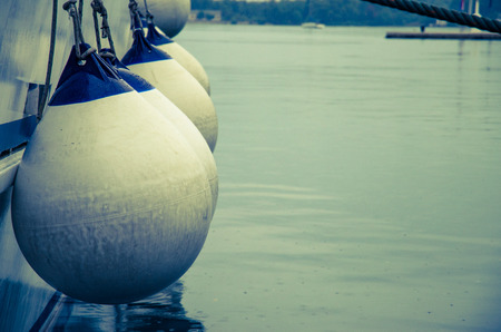 buoys hang in the boat side