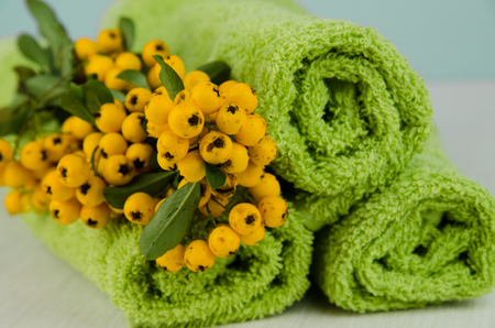 spa and wellness concept with green towelsの写真素材