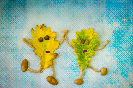 colorful autumn leaves dancing coupleの写真素材