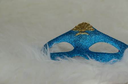 blue shining mask against white bakgroundの写真素材