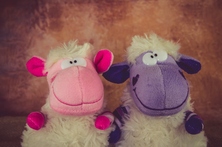 two happy smiling Easter sheep toyの写真素材