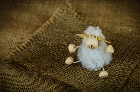 lovely white happy smiling Easter sheep toyの写真素材