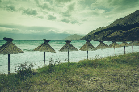 beach with umbrellas in Croatian resortの写真素材