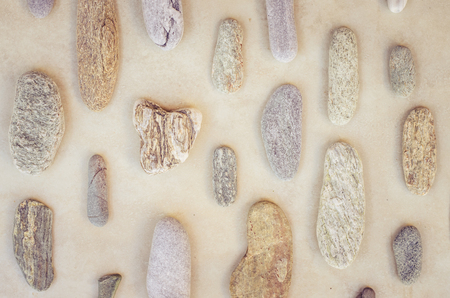 group of sea pebble background top viewの写真素材