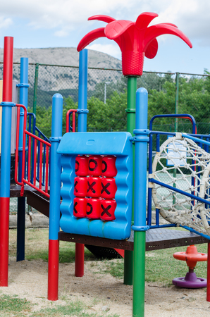 colorful toy equipment in children playgroundの写真素材