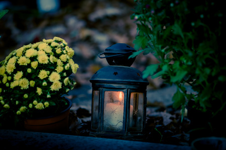 Red burning candles during All Saints Day at the cemeteryの写真素材